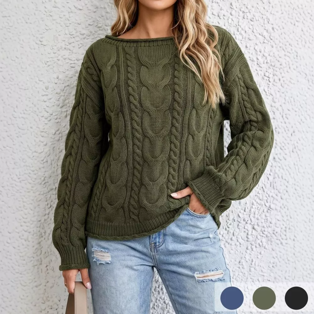 Maglione donna verde con lavorazione a treccia indossato con jeans chiari