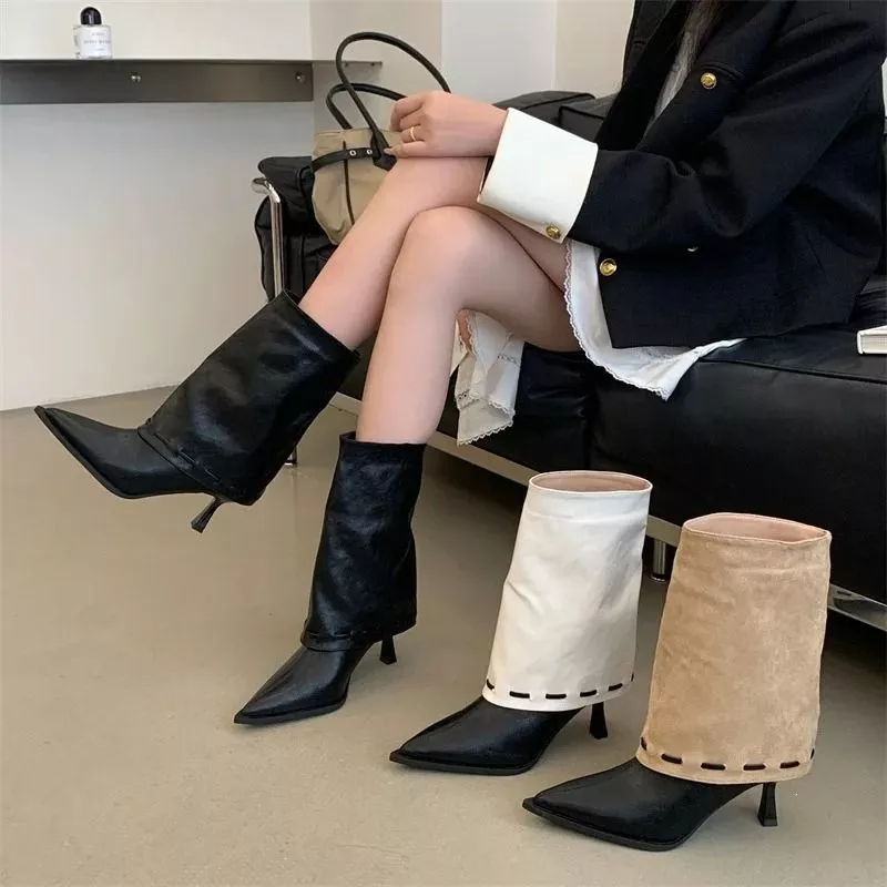 Collezione di tronchetti donna in tre colori: nero, bianco e beige, con tacco a spillo e gambale ampio